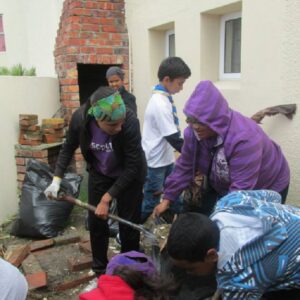 cleaning up the garden by 1st strandfontein scouts